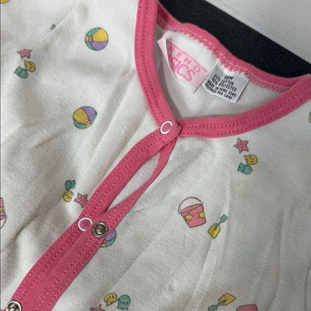 White Infant Snap Romper with Pink Trim and Beach Toy Print 90’s